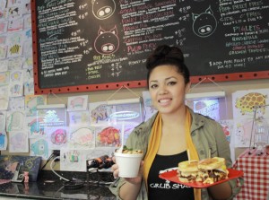 Pork Belly Grub Shack employee Jennifer Phan, 20, says the best part about working there is the bond between the customers and her co-workers. 