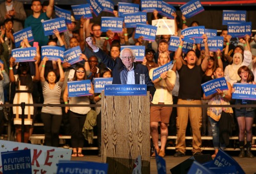Presidential candidate Bernie Sanders salutes the crowd after finishing his rally at Bonney Field in Sacramento, California on May 9 2016. (Photo by Kyle Elsasser)