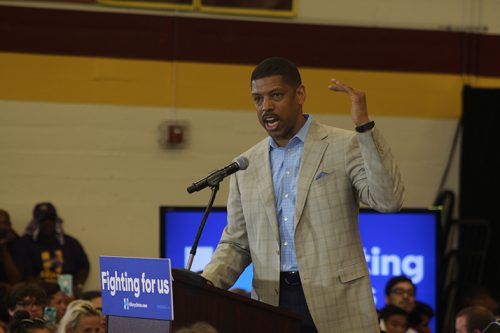 Sacramento mayor Kevin Johnson speaks at a campaign event for Hillary Clinton at Sacramento City College on June 5, 2016. Johnson recieved audible boos from the audience as he took the podium. (Photo by Mack Ervin III)