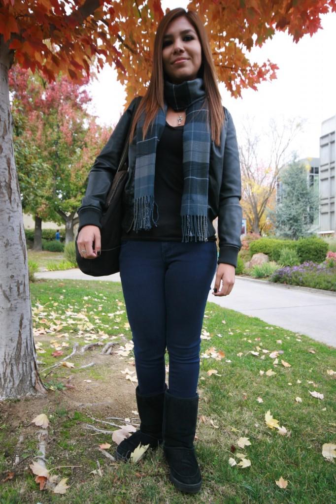 Nursing major Stephanie Sanchez, 19, wears a pair of Bearpaw boots and a Dockers scarf on Nov. 23, 2011. (Photo by Shanel Royal)