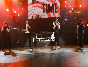 The four members of Big Time Rush performing in Sacramento on Feb. 20.