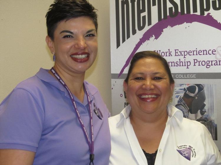 Connie Ayala, Program Coordinator Cooperative Work Experience, and Kendalyne Murti greet  visitors at the Career Center Open House on Feb  23.