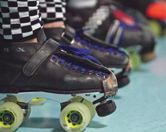 The skates of a roller derby girl at a practice on March 13. (Photo by Daniel Romandia)