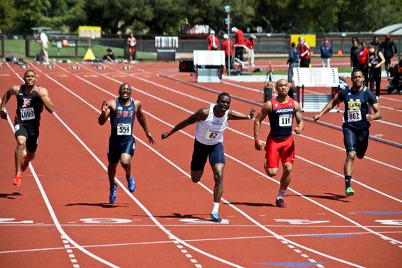 American River College sophomore sprinter Diondre Batson, center, crosses the finish line of the 100-meter race at the Stanford Invitational on April 6 in Palo Alto, Calif. Batson (10.27 seconds) set a school record in the race, and also set the school record in the 200-meter (20.53) on April 13 in Walnut, Calif. (Photo courtesy of Rick Anderson)