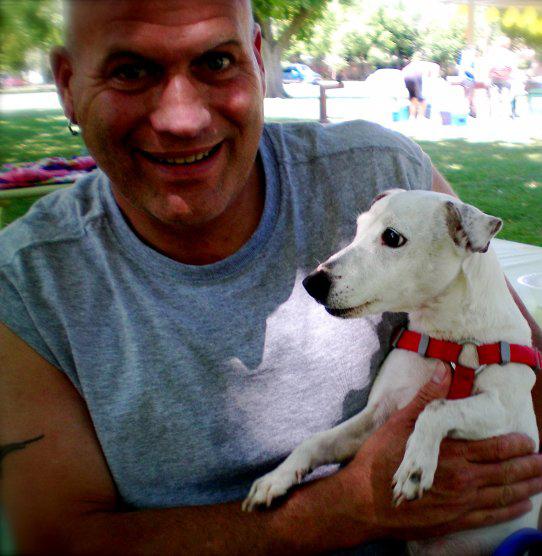 Clyde Wade, holding his dog Hootie, was diagnosed with HIV in 2004. Wade has since began helping others educate themselves on protection from the disease. (Photo courtesy of Clyde Wade)
