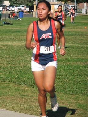 Sophomore Monica Madavi running at the last Big Eight Conference Championship. (Photo courtesy of Jeanette Allred-Powless)