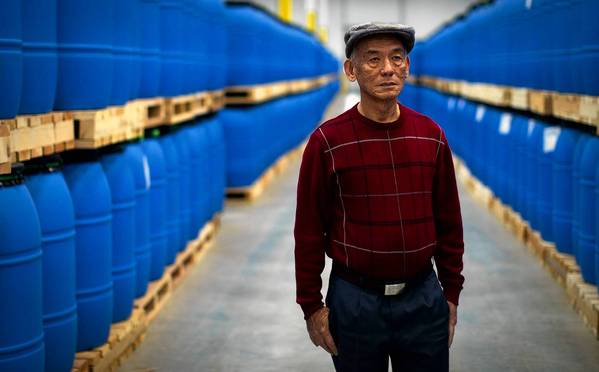 IRWINDALE, CA - MARCH 6, 2013: David Tran, Sriracha founder and creator, has expanded his hot sauce company Huy Fong Foods to a large facility in Irwindale, California. The warehouse contains rows and rows of fresh chilies used in the hot sauce. (Gina Ferazzi / Los Angeles Times)