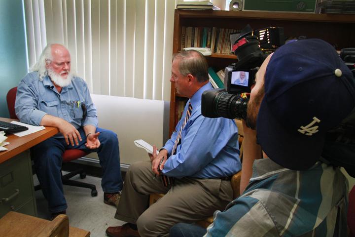 Professor Geoffrey Stockdale sits down with Tom DuHain of KCRA 3 to discuss the impromptu westling demonstration that occurred in his classroom the night of Oct. 14. (Photo by Alisha Kirby)