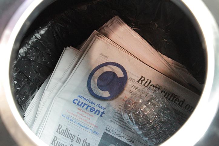 Dozens of copies of “The Current” sit in a trashcan after ASB representative Jorge Riley threw them away. 