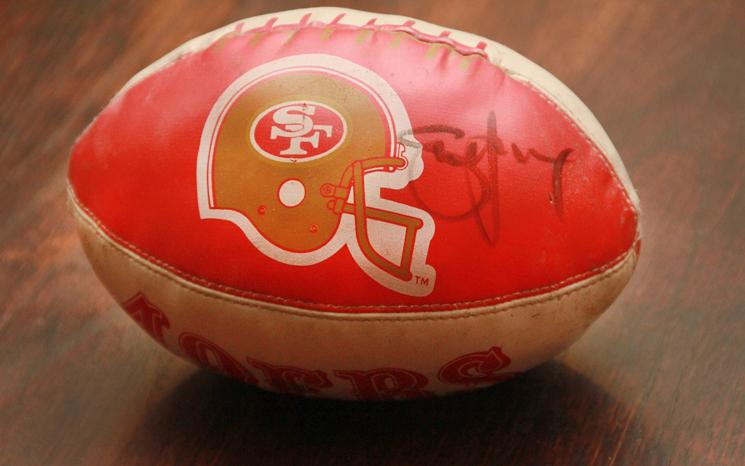 A children’s 49ers football autographed by Steve Young, the last Quarterback to win a Super Bowl as a 49er.