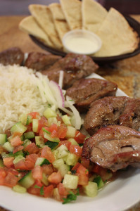 Royal Kebab located in Citrus Heights serves lamb marinated and spiced with cumin, paprika, bell pepper, Greek yogurt and lemon juice and cooked under an open flame oven and served with rice and a tomato and cucumber salad.