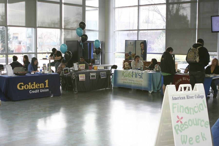 Students receive help from  several booths inside the Student Center during Financial Resource Week. 