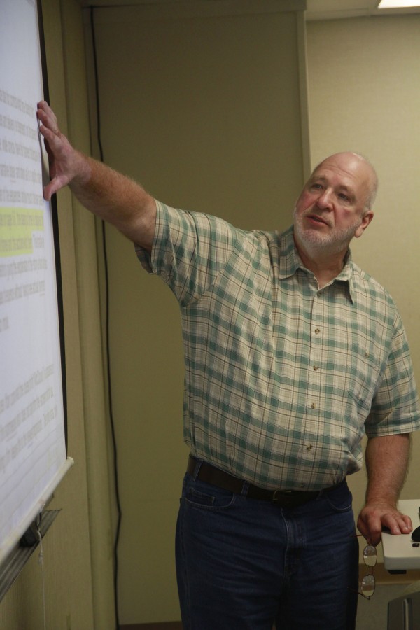 Professor Bob Lyman showing an example on D2L of what he is looking for in an answer during class. (Photo by Brandon Nelson)