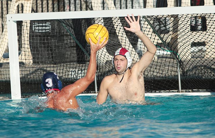 Freshman Ryan Eyman attempts a shot in a water polo match against Santa Rosa Junior College on Sept. 24. The American River College men’s team won the match 15-11. (Photo by Emily K. Rabasto)