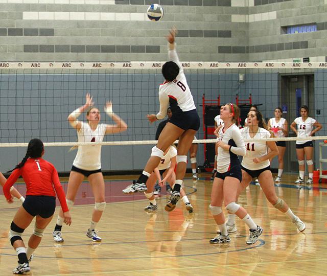 Erianna+Williams+jumps+to+spike+the+volleyball+during+a+home+match+against+Santa+Rosa+Junior+College+on+Oct.+15