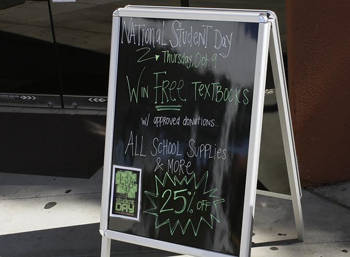 A sign outside of the American River College Beaver Bookstore advertises National Student Day and the events going on Oct. 9.