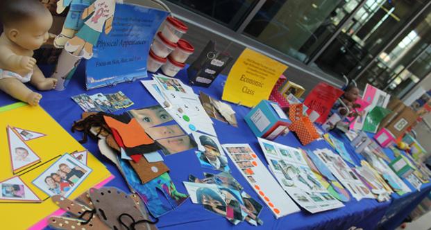 A table at the Diversity Day displayed examples and literature that are taught to our preschoolers concerning diversity.