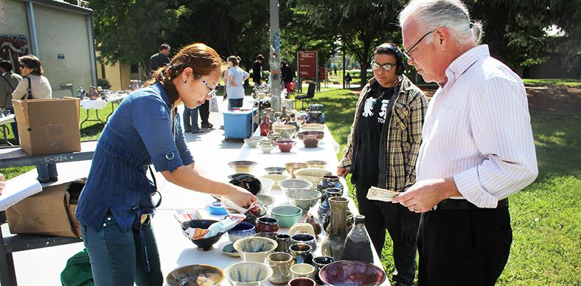 Students from the ceramics department sell their art