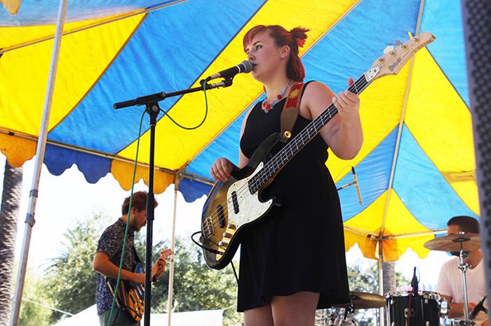 Left to right, American River College alumnus, Brodie Mills, plays guitar, Orey Severet plays drums and lead singer and bassist, Emma Simpson, sings at Chalk It Ups 25th annual art festival on Labor Day weekend in Fremont park in downtown Sacramento. The band calls itself The Off Years, which refers to the years they were not in a band together. (Photo by Cheyenne Drury)