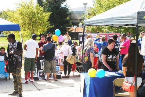 Clubs are gathered around the student center encouraging students to join. Game-themed Club Day was hosted at ARC on Sept. 24, 2015. (Photo By Ashley Nanfria)