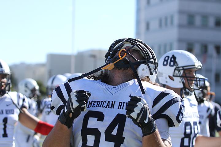American River College offensive lineman Vaipou Garrigan Afamasaga screams in celebration after ARC football’s 20-17 win over powerhouse City College of San Francisco on Sept. 26, 2015. American River College pulled ahead with a 25 yard field goal during the last play of the game. (Photo by Barbara Harvey)