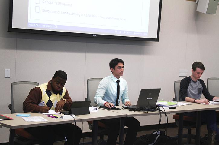 Associated Student Body Senate Vice President Samuel Kinsey, left, President Garrett Kegel and Clubs and Events Board President Justin Nicholson call the first  Student Senate meeting of the semester to order. Senate and CAEB are slowly filling the boards that were mostly vacant at the start of the semester. (Photo by Matthew Wilke)