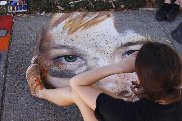 Folsom Lake College student Julia Flippo works on her close up chalk profile of a young girl at Chalk It Ups 25th annual art festival Labor Day Weekend in Fremont park, downtown Sacramento. Flippo placed second in The Peoples Choice, an award that all artists who rent out a sidewalk space are contenders for.