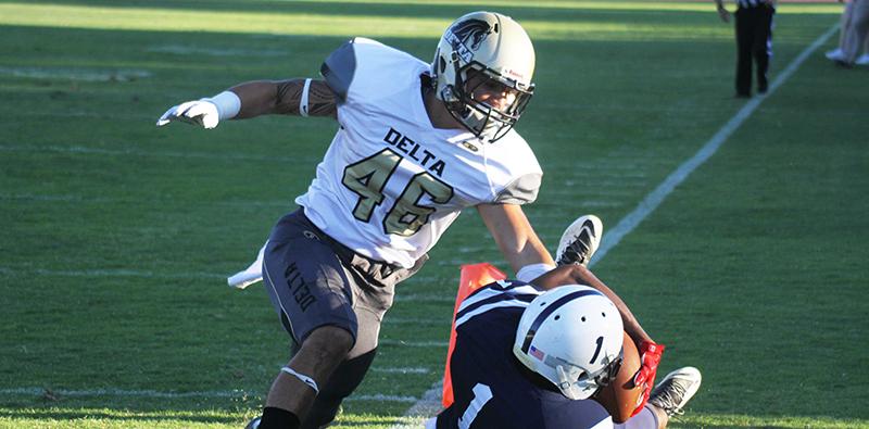 American River College wide receiver Khalil Hudson catches a 29-yard touchdown pass from quarterback Jihad Vercher during ARC football’s 44-24 win over San Joaquin Delta College on Saturday, Sept. 19, 2015. Vercher threw for 287 yards and 5 touchdowns. (Photo by Barbara Harvey)