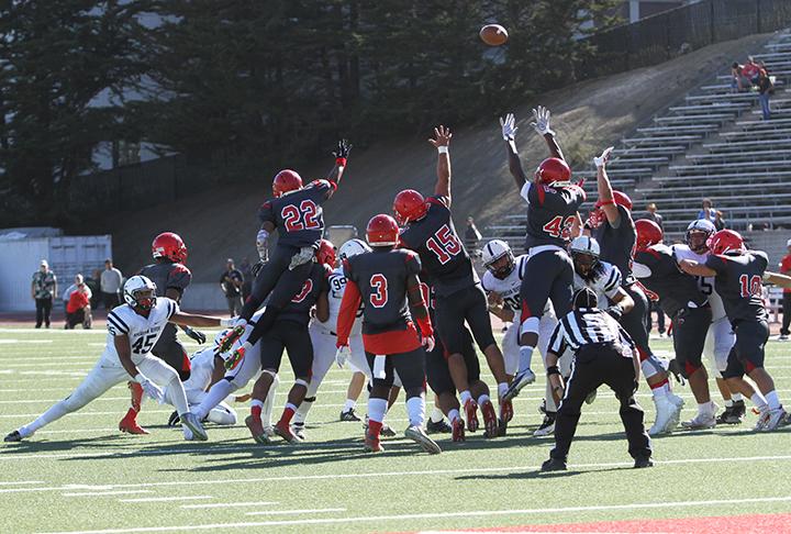 City College of San Francisco’s special teams players attempt to block American River College’s game-winning 25-yard field goal during ARC’s 20-17 win over CCSF on Sept. 26, 2015. The game-ending field goal win was a reversal of the 2014 NorCal Championship game, which ARC lost 17-14 when CCSF scored a field goal during the last minute of the game. (Photo by Barbara Harvey)