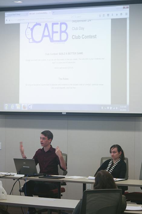 CAEB President Justin Nicholson, left, explains his plans for the Sept. 24 club day as vice president Mary Stedman looks on. CAEB had five vacant positions at their first meeting of the semester Tuesday. (Photo by John Ferrannini)