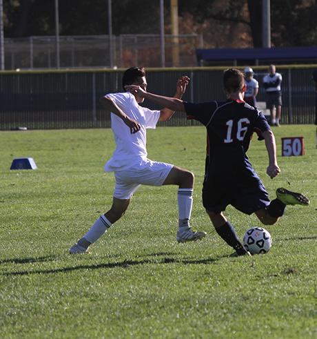American River College freshman defenseman Ryan Kane,left, tries to kick the ball past Napa Valley Colleges Edgar Ayala during ARCs 1-0 loss against Napa on Thursday Sept.17, 2015.
Both teams struggled on to score during the game , as the games only goal came in the first half. (photo by Matthew Wilke)