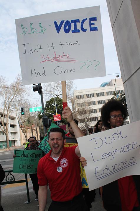 Cameron Weaver protests at the annual March In March in downtown Sacramento last spring. Weaver was elected as Student Trustee last spring, a paid position on the Los Rios Community College Districts Board of Trustees. (File photo)