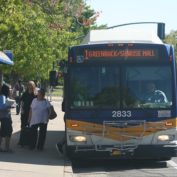 Students board the No. 1 Bus on the corner of College Oak Drive and Orange Grove Avenue adjacent to American River College. Students should support Measure A, which would renew the universal transit pass for Los Rios students. (Photo by John Ferrannini)