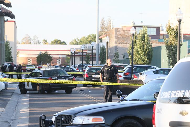 Police cars block off the scene of the fatal shooting at Sacramento City College that left one student dead and two injured on Sept. 3, 2015. (Photo by Ashlynn Johnson)