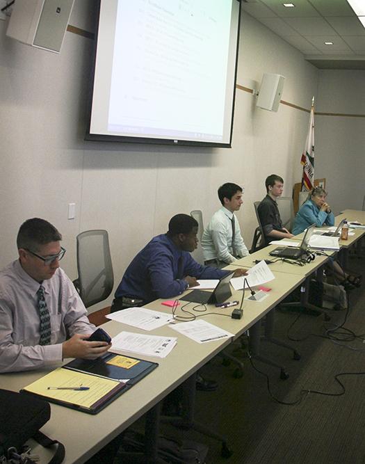 From left to right, Sen. David Hylton, Vice President Sam Kinsey, Senate President Garret Kegel, Clubs and Events Board President Justin Nicholson and Sen. Laurie Jones listen to Dean Adam Karp’s presentation on American River College’s accreditation during the Student Senate meeting Thursday. Members discussed the universal transit pass measure up for a vote on Sept. 22 and 23. (Photo by Jordan Schauberger)