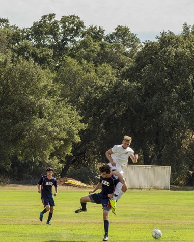 Two players fight for the possession of the ball in ARC's season opening loss to Feather River College. ARC had control of the ball more frequently throughout the match but did not score, losing 1-0. (Photo by Joe Padilla)