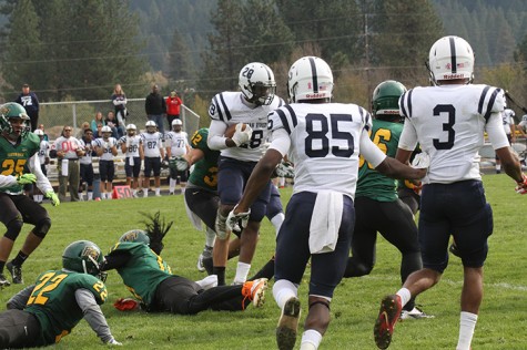 Armand Shyne, running back for American River College attempts a spin move against Feather River on Oct. 24, 2015. ARC was victorious 44-14, Shyne led the team with 108 yards on 10 carries with a touchdown. (Photo by Nicholas Corey)