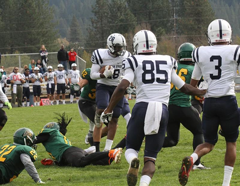 Armand Shyne, running back for American River College attempts a spin move against Feather River on Oct. 24, 2015. ARC was victorious 44-14, Shyne led the team with 108 yards on 10 carries with a touchdown. (Photo by Nicholas Corey)