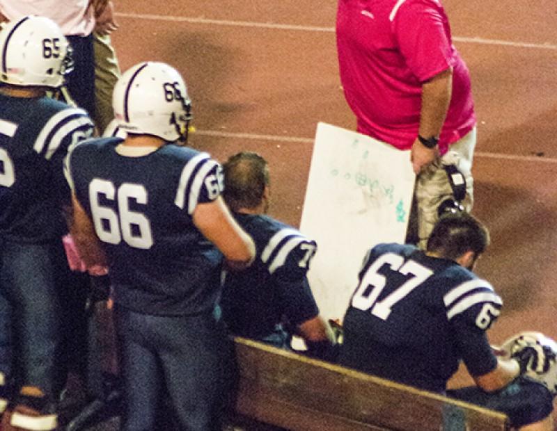 American River College’s offensive coach Josh Crabtree draws out a play for the offensive against College of the Sequoias at AR on Oct 17. The Beavers went on to win the game 49 to 31.(Photo by Joe Padilla)