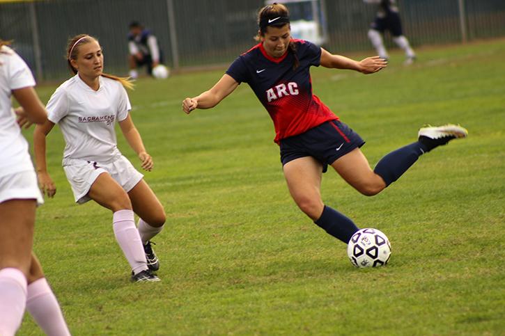 Midfielder Gabby Krewer passes the ball to a teammate in her game against Sacramento City College. The American River College womens soccer team defeated Sac City 3-0. (Photo by Joseph Daniels)