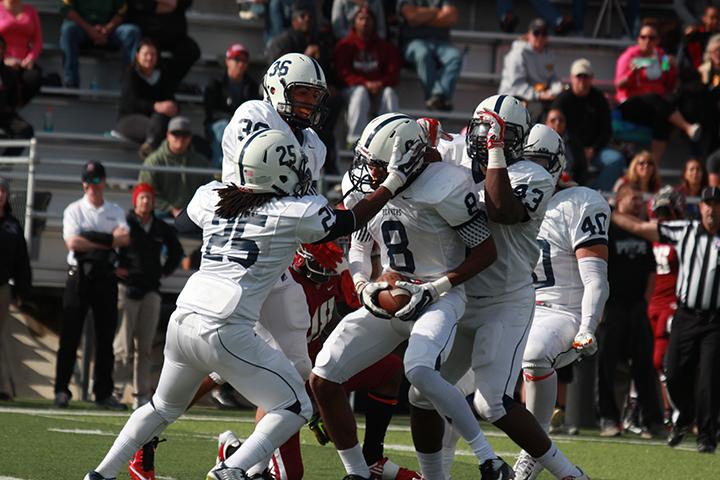 Former American River College cornerback Malcolm Scott celebrates with teammates after an interception in last seasons 31-22 win over Sierra College. ARC has defeated Sierra in two of their last three meeting and looks to improve its conference record to 3-0 on the season. (File Photo)