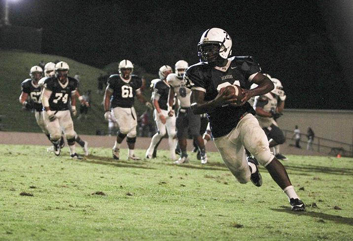 American River College running back Wadus Parker runs upfield during last seasons 24-14 win over College of San Mateo. ARC, ranked no.1 in NorCal, will travel to San Mateo, ranked no.2 in NorCal, Saturday in a rematch of last seasons game. (File Photo)  