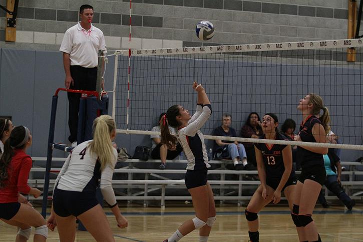American River College safety Monica Udahl performs a backward set in order to get the ball to a teammate. ARC swept Cosumnes 3-0 by scores of  25-14, 25-11, 25-22 on October 21, 2015 .(Photo by Nicholas Corey)