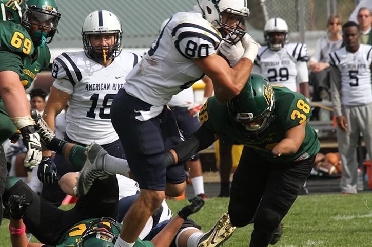 Marc Ellis, wide receiver for American River College fights for extra yards after the catch. Ellis had one reception for nine yards in the 44-14 victory as ARC faced Feather River on October 24, 2015.(Photo by Nicholas Corey)