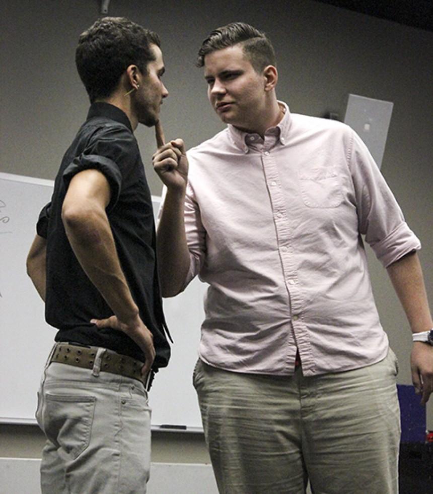 Beto Jimenez, left, and Nate Breshears, right, acting out a worker and bosses daughter skit at the meeting of the American River College Improv club Thursday, Sept. 24. The club held a late night punk rock themed meeting where volunteers participated in games and skits. (Photo by Ashlynn Johnson)
