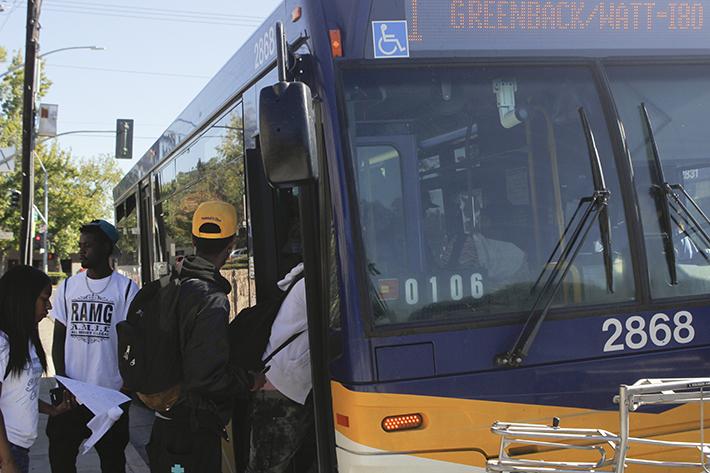 American River College students board the No. 1 bus at Orange Grove Avenue and College Oak Drive. A crime bulletin was sent out to ARC students that said a woman was robbed at the bus stop late Monday. (Photo by Joseph Daniels)