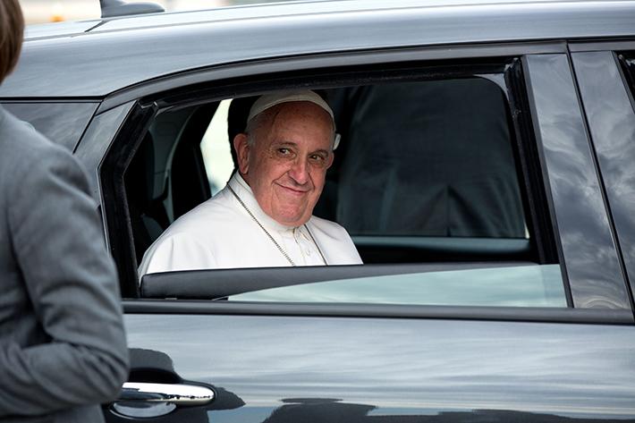 Pope Francis sits in the back seat of a Fiat as he is driven away from Andrews Air Force Base on Sept. 22, shortly after arriving in the United States. The Pope visited Washington, New York and Philadelphia (Photo courtesy of the White House).