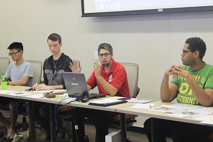 Associated Student Body Student Senate President David Hylton, center right, is able to keep his position on the board after an attempt to recall him last week failed (Photo by Jordan Schauberger).