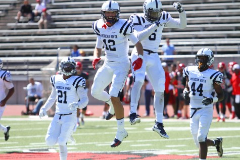 American River College wide receiver Jonathan Lopez and defensive back Leonard Nelson celebrate after Nelson’s interception of a pass from City College of San Francisco quarterback Anthony Gordon. ARC defeated powerhouse CCSF 20-17, with the defense holding CCSF to 2.1 yards per rush. (Photo by Barbara Harvey)
