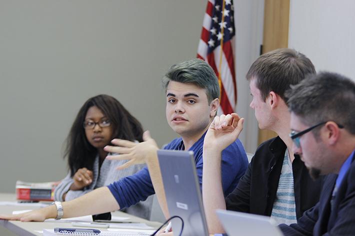 Sen. James Cortright discusses a resolution in support of a proposed LGBT pride center on campus at Thursdays meeting of the Student Senate (Photo by Jordan Schauberger).